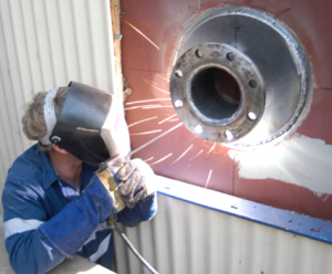 Welding flange to digester for hot tap new outlet